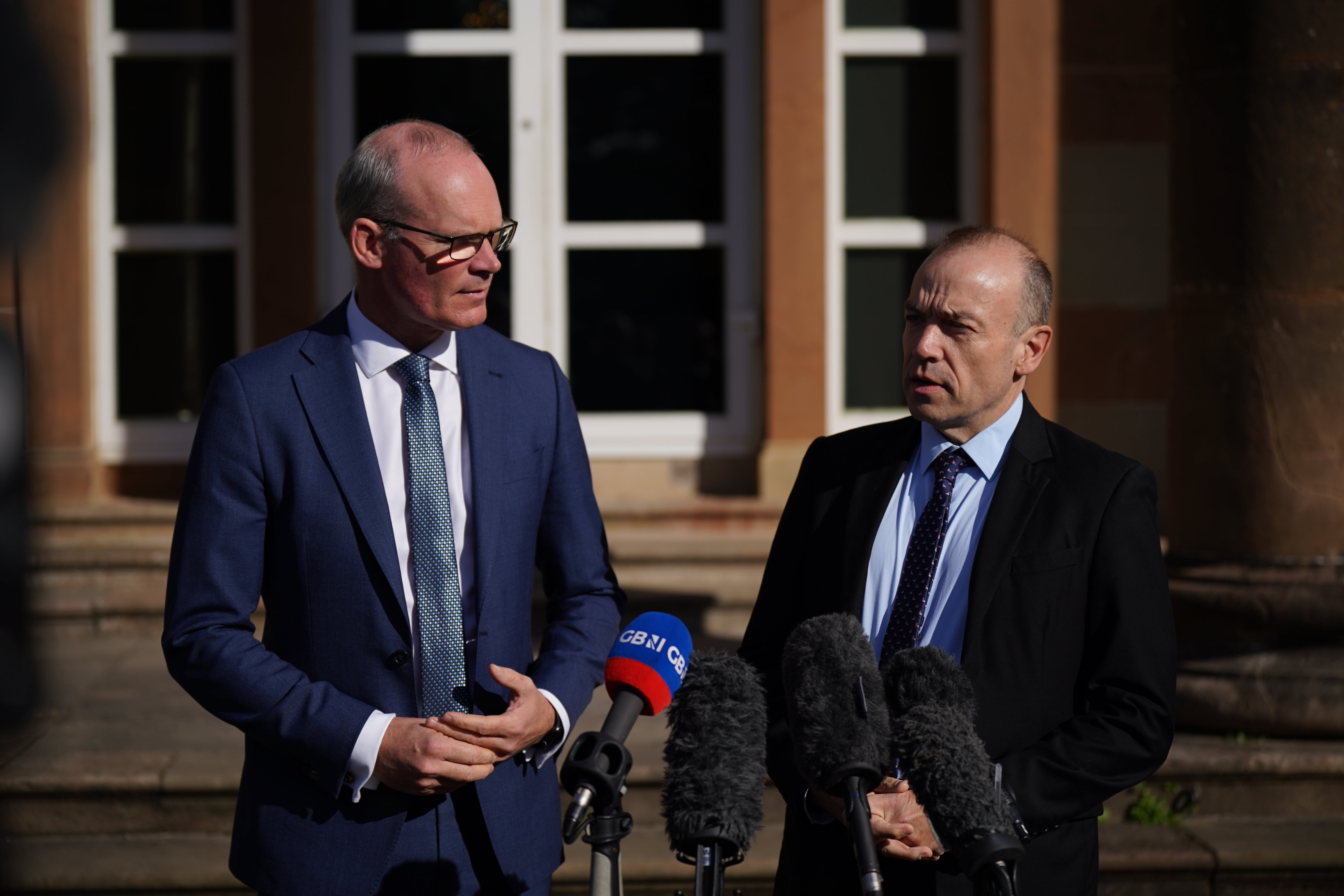 Northern Ireland Secretary Chris Heaton-Harris, right, and Irish Foreign Affairs Minister Simon Coveney have met for talks (Niall Carson/PA)