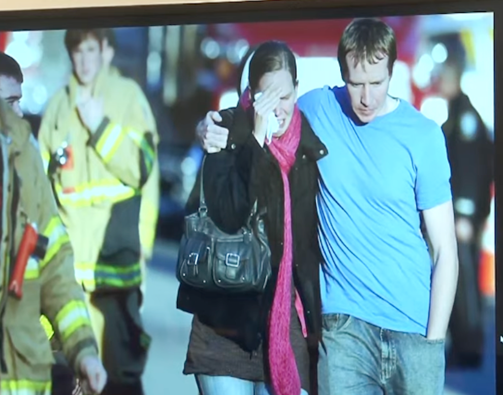 Screenshot of a photo of Alissa and Robbie Parker leaving the firehouse at Sandy Hook having learned their daughter Emilie had been killed in the shooting on 14 December 2012