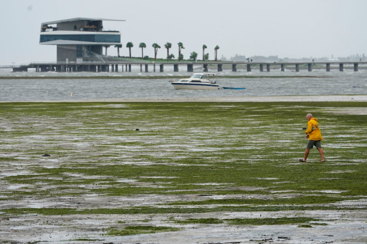 News outlets under fire over videos of reporters covering Hurricane Ian