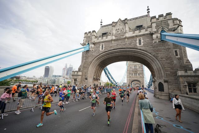 <p>London Marathon participants are being urged to learn CPR (Yui Mok/PA)</p>