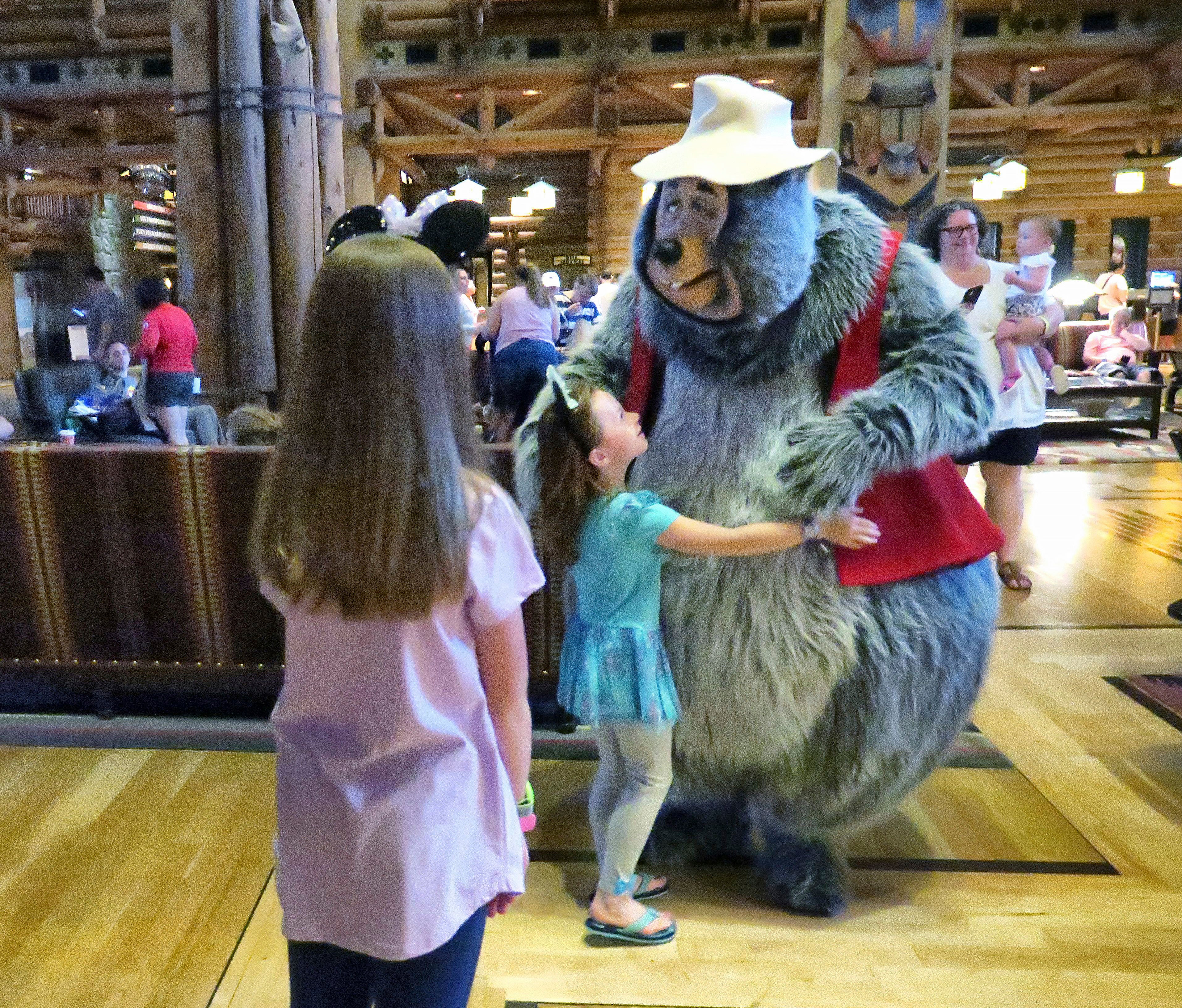 Disney character Big Al entertains children during Hurricane Ian shut in