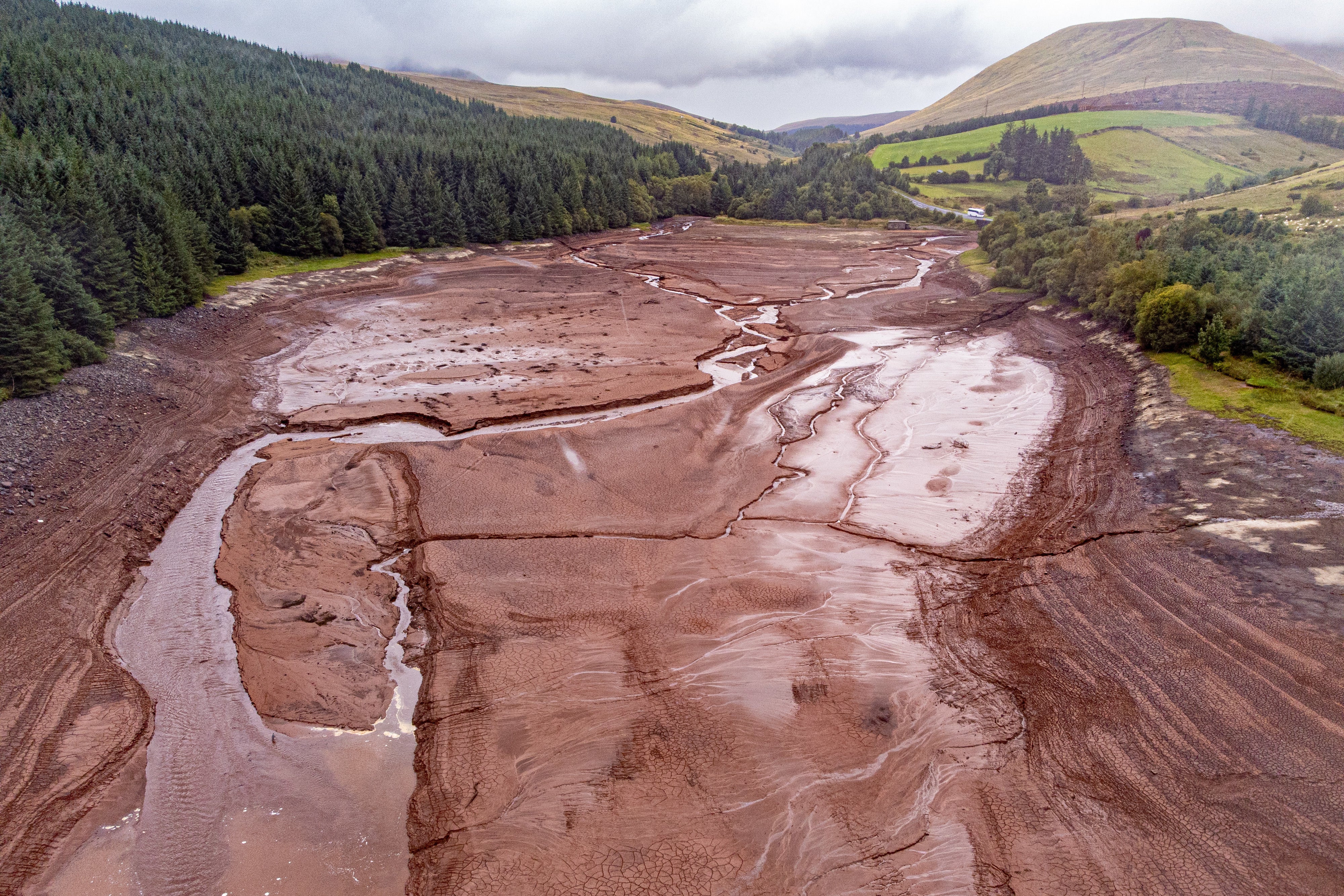 General views of Cantref Reservoir in Brecon Beacons National Park, Wales, where water levels are low.