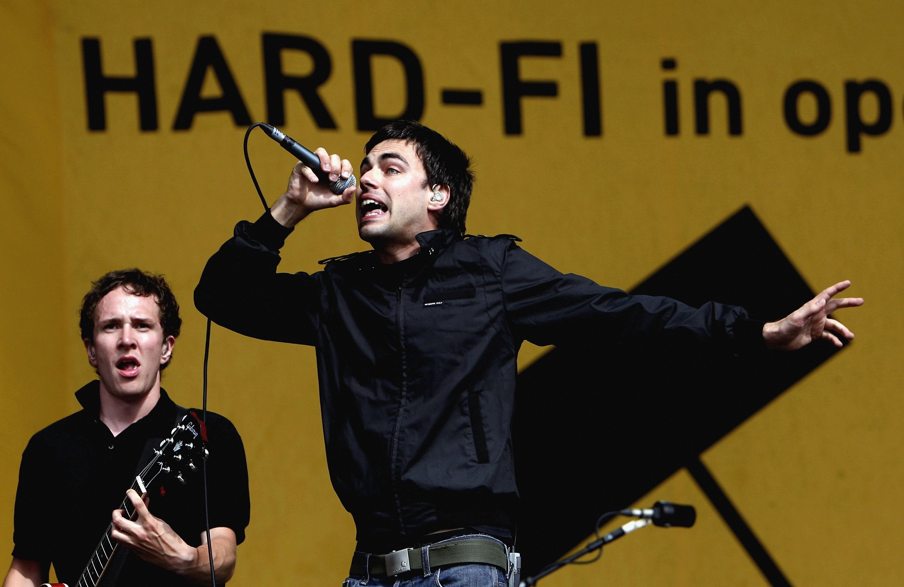 Richard Archer (centre) performing with Hard-Fi at T in the Park, 2006