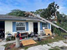 Woman braves Hurricane Ian flood to check on stranger's mom