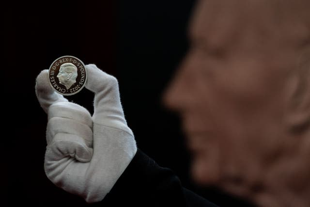 <p>The official coin effigy of King Charles III on a £5 Crown commemorating the life and legacy of Queen Elizabeth II (Aaron Chown/PA)</p>