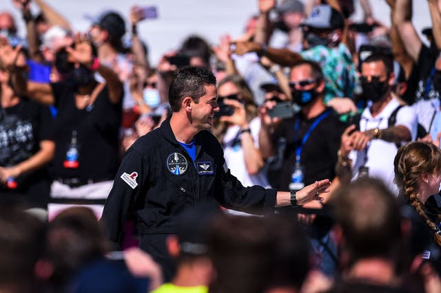 <p>US billionaire businessman and pilot Jared Isaacman waves during the Inspiration4 crew send off at NASA’s Kennedy Space Center in Florida, on September 15, 2021</p>