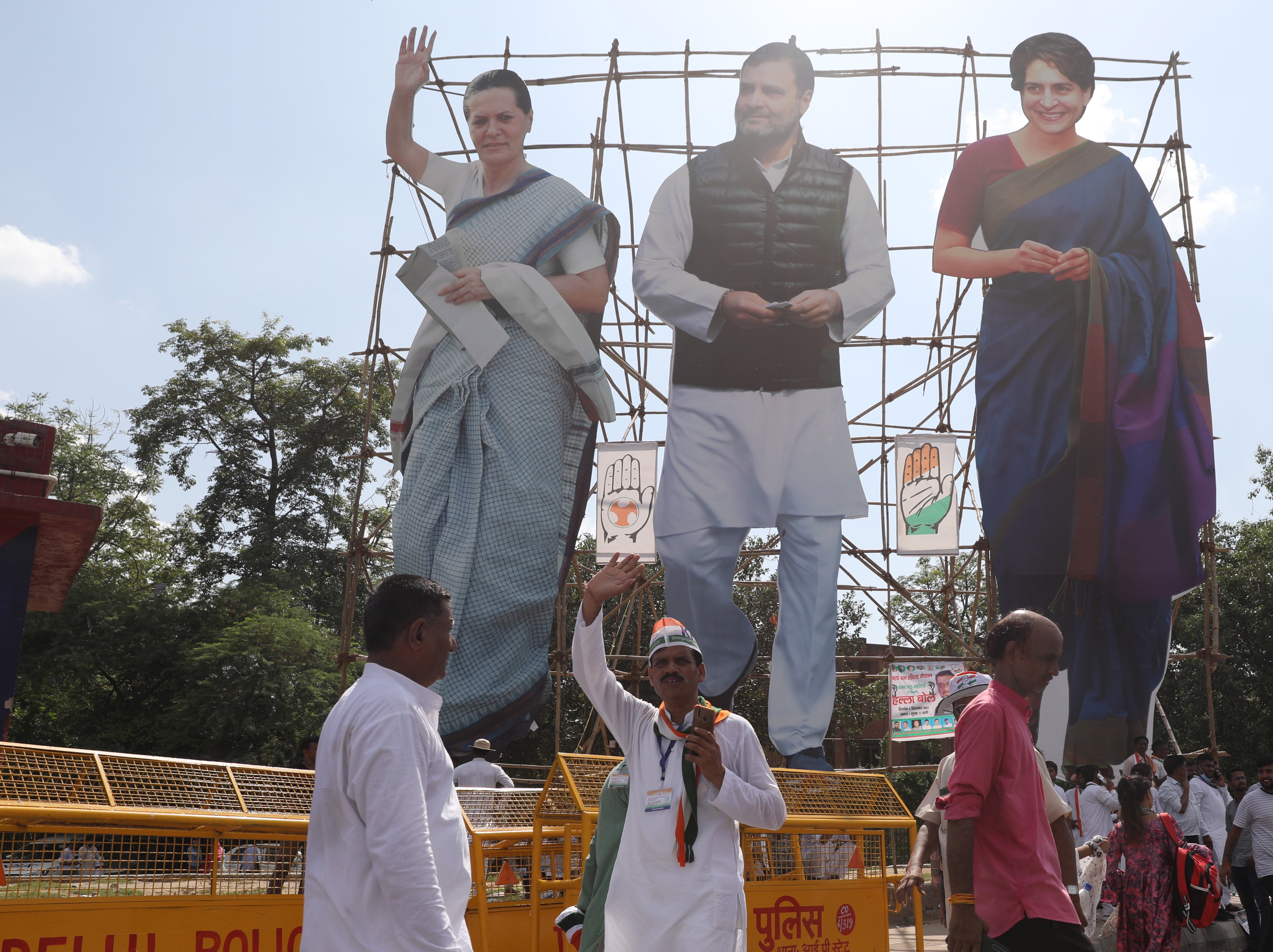 Cut outs of Sonia Gandhi (L), her son Rahul Gandhi (C) and daughter Priyanka Gandhi Vadra at a Congress rally