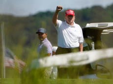 Trump aide rides along on golf cart with ex-president to show him positive news stories