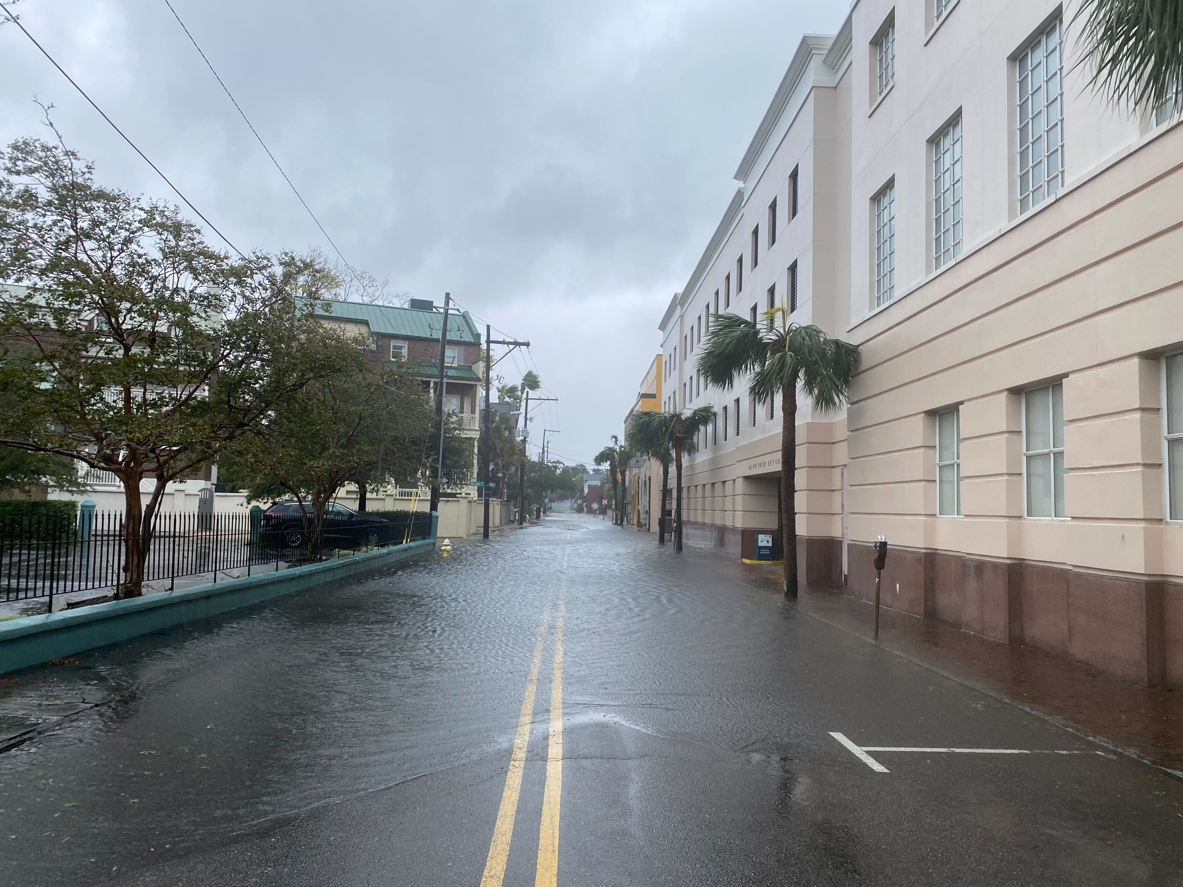 Flooding had closed more than a dozen streets in Charleston by midday Friday. The city sits right at sea level on the Carolina coast