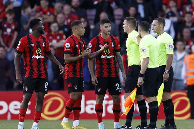Bournemouth’s Jefferson Lerma (left), Marcus Tavernier (centre) and Marcos Senesi speak to referee Thomas Bramall after the Premier League match at the Vitality Stadium, Bournemouth. Picture date: Saturday October 1, 2022.