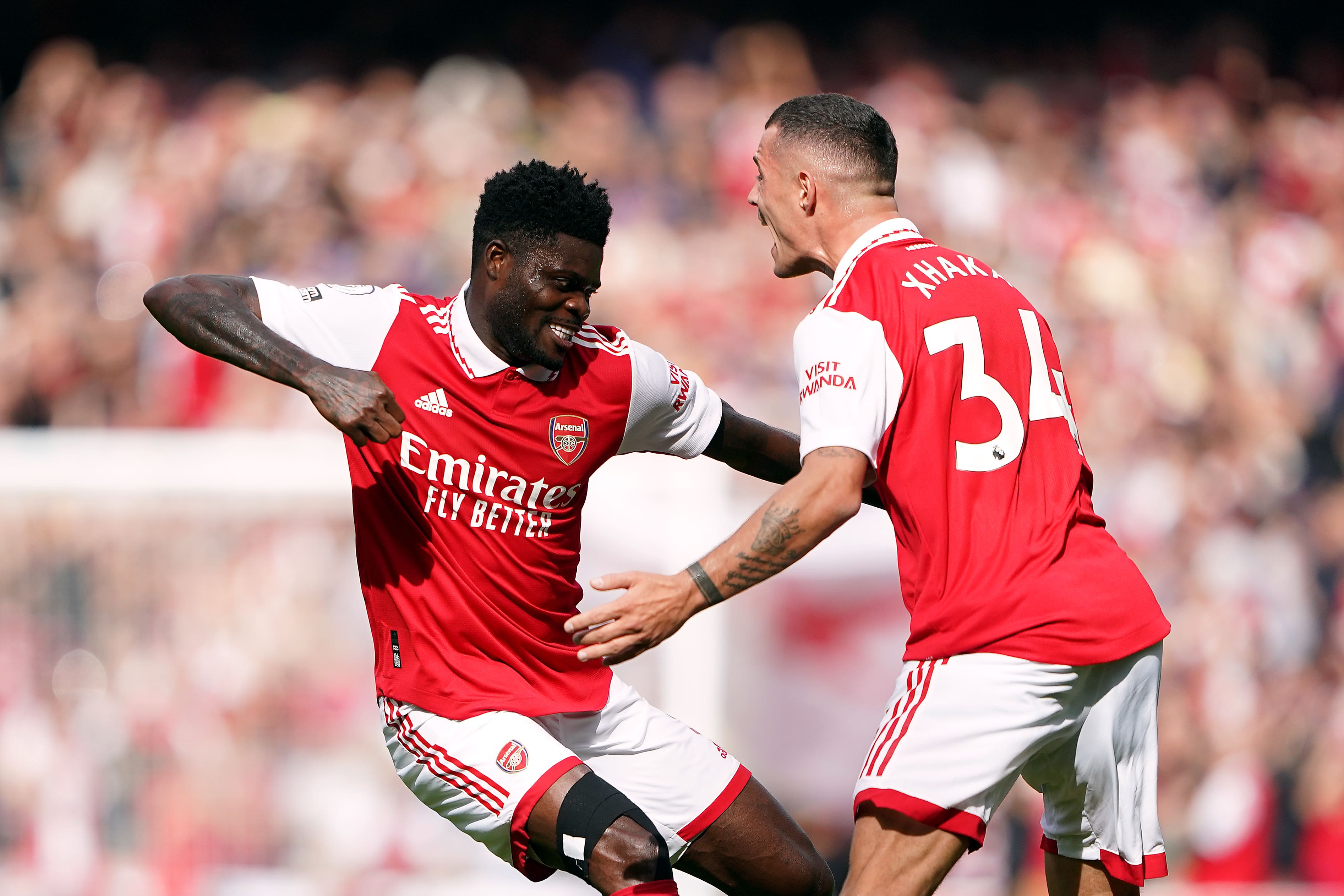 Thomas Partey celebrates scoring Arsenal’s first goal against Tottenham (Zac Goodwin/PA)