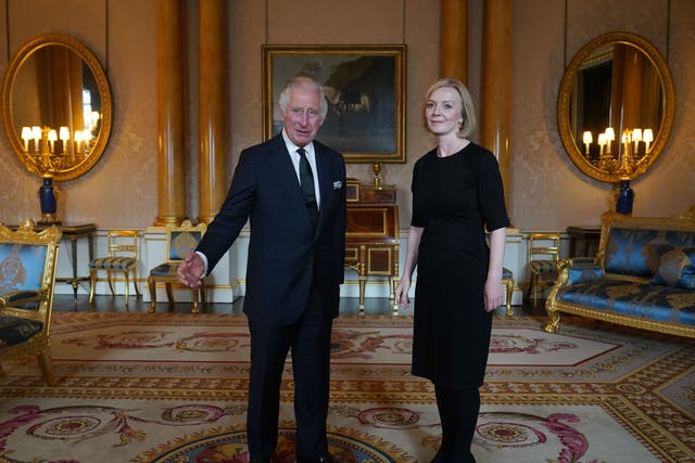 <p>King Charles welcomes Liz Truss at Buckingham Palace (Yui Mok/PA)</p>