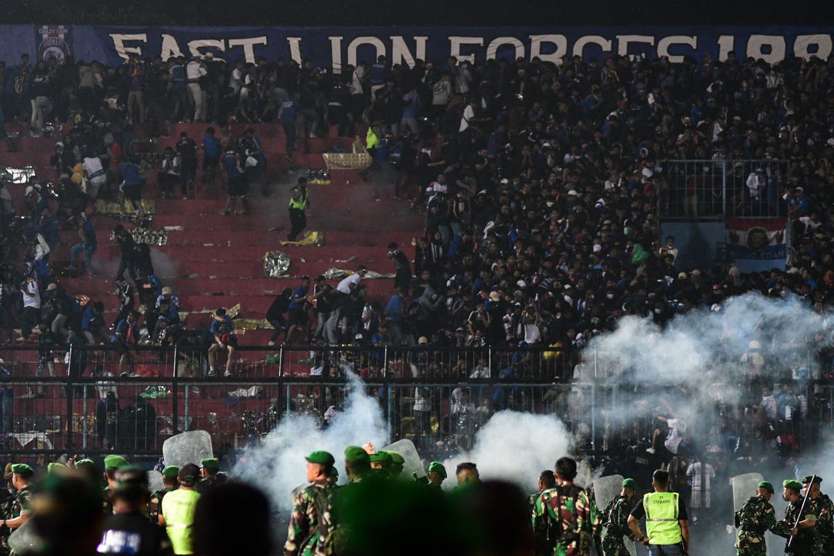 Indonesia football riot latest: 174 dead after stampede in Kanjuruhan stadium in East Java