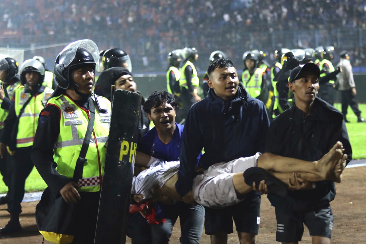 How a football match upset win led to violence and stampede in Indonesia