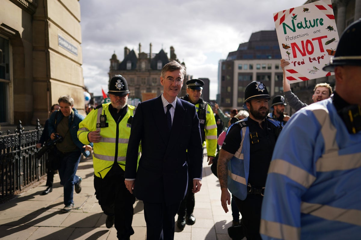 Jacob Rees-Mogg booed by protesters outside Tory conference