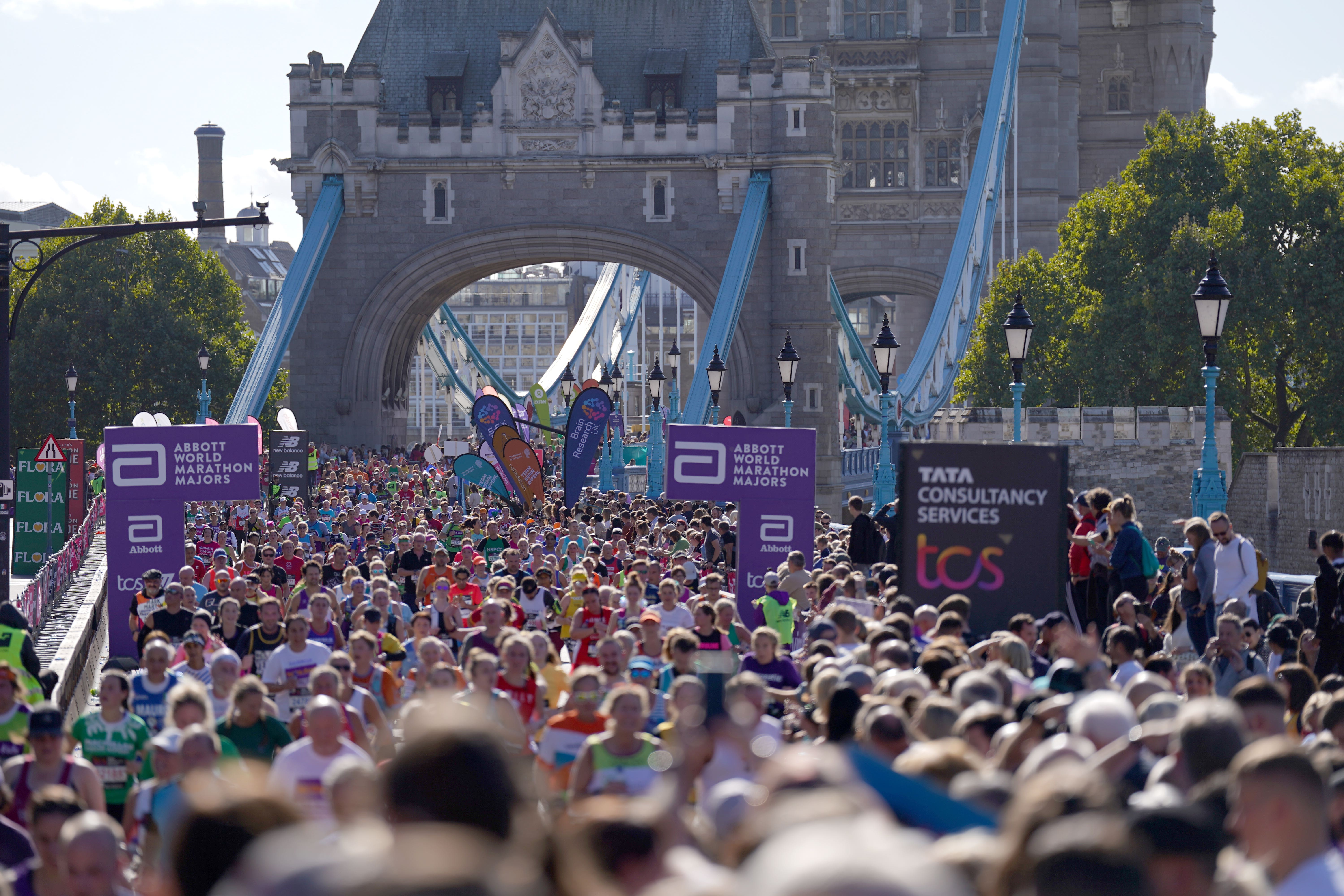 Competitors make their way over Tower Bridge during the London Marathon (Kirsty O’Connor/PA)