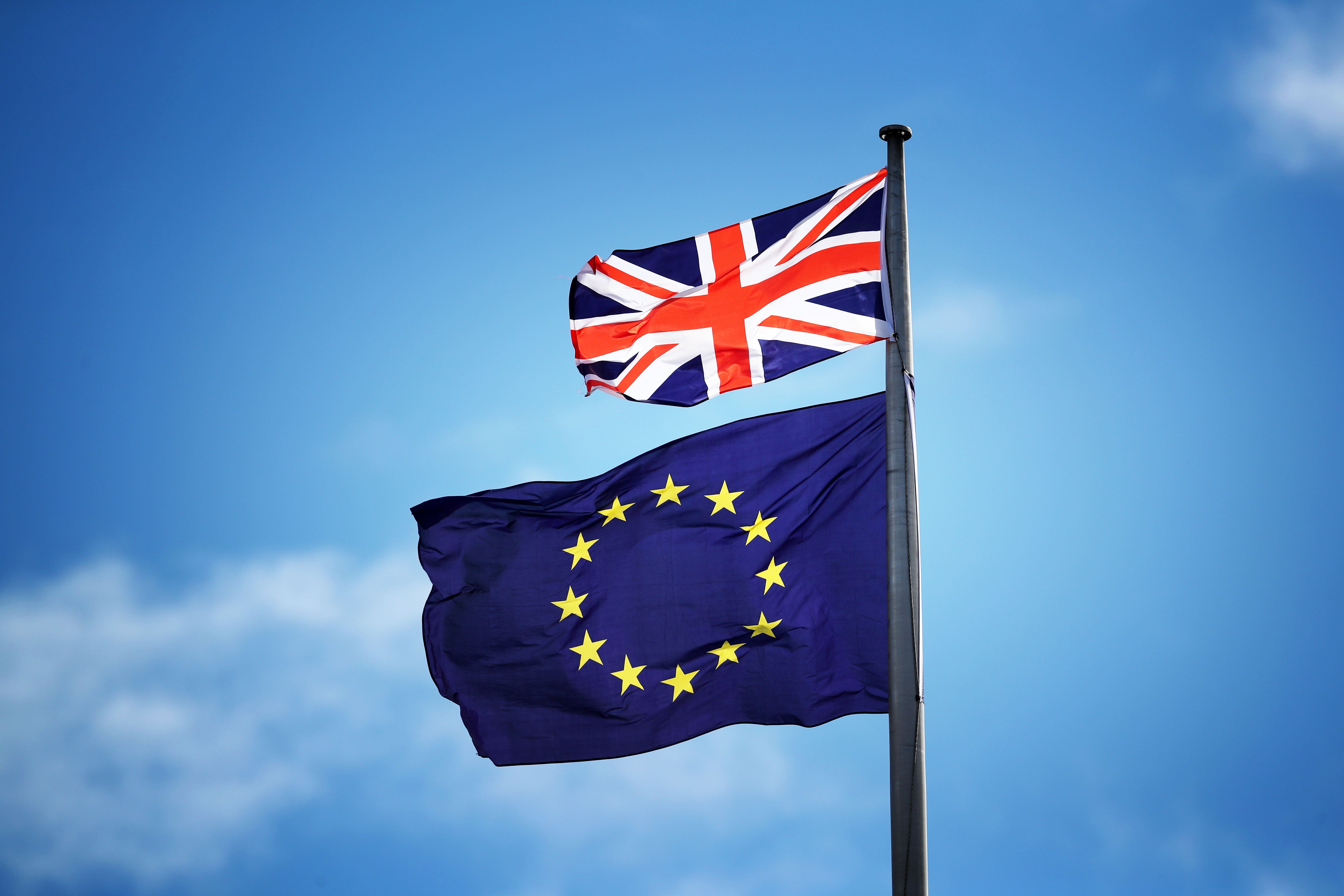 The Union flag and the EU flag (Jane Barlow/PA)