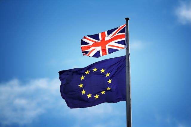 <p>The Union flag and the EU flag (Jane Barlow/PA)</p>