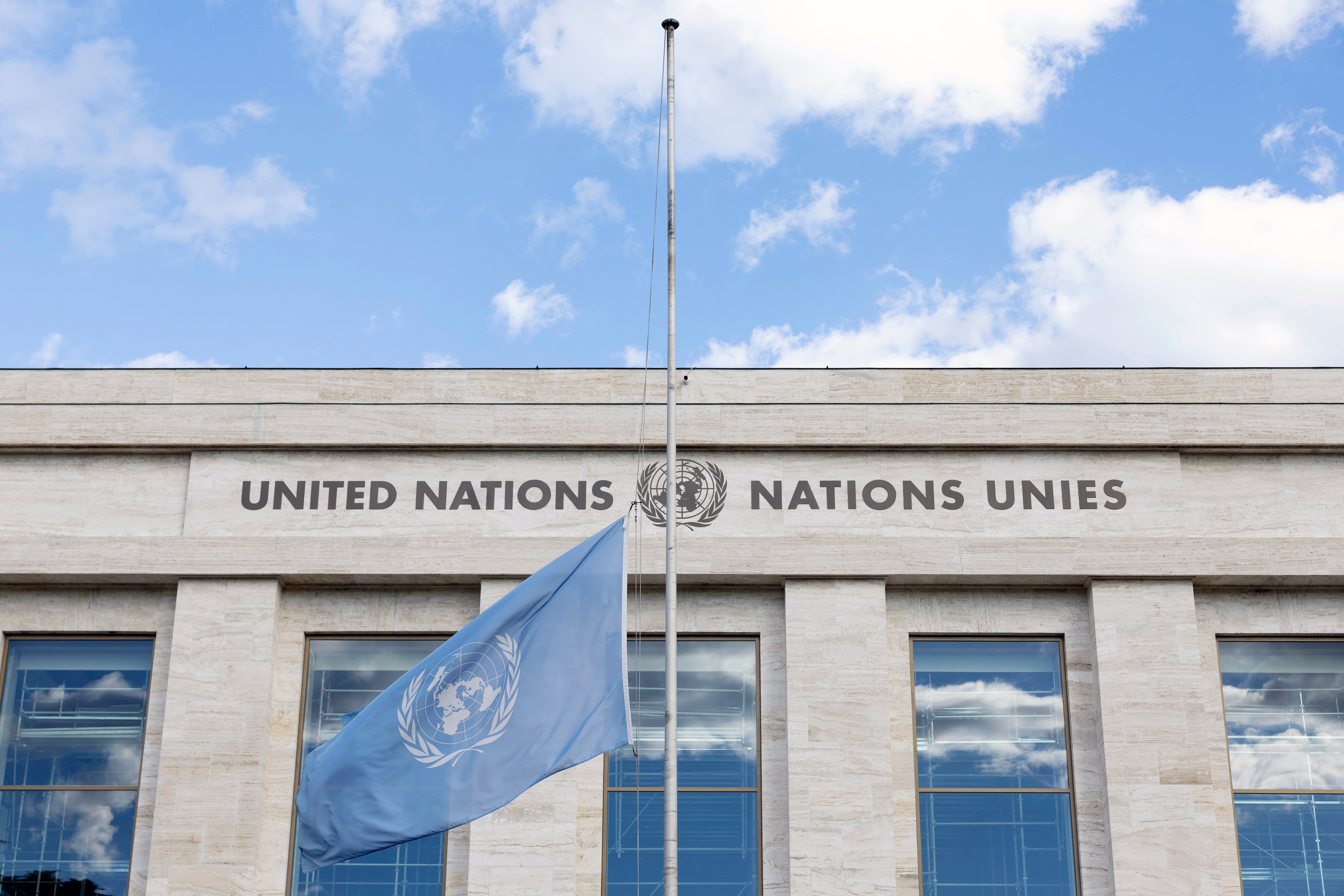 The United Nations (UN) flag flies at half mast following the passing of Britain's Queen Elizabeth II at its headquarters in Geneva, Switzerland