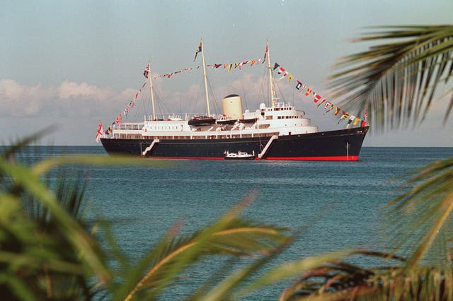 The Royal Yacht Britannia at anchor off the Cayman Islands (PA)