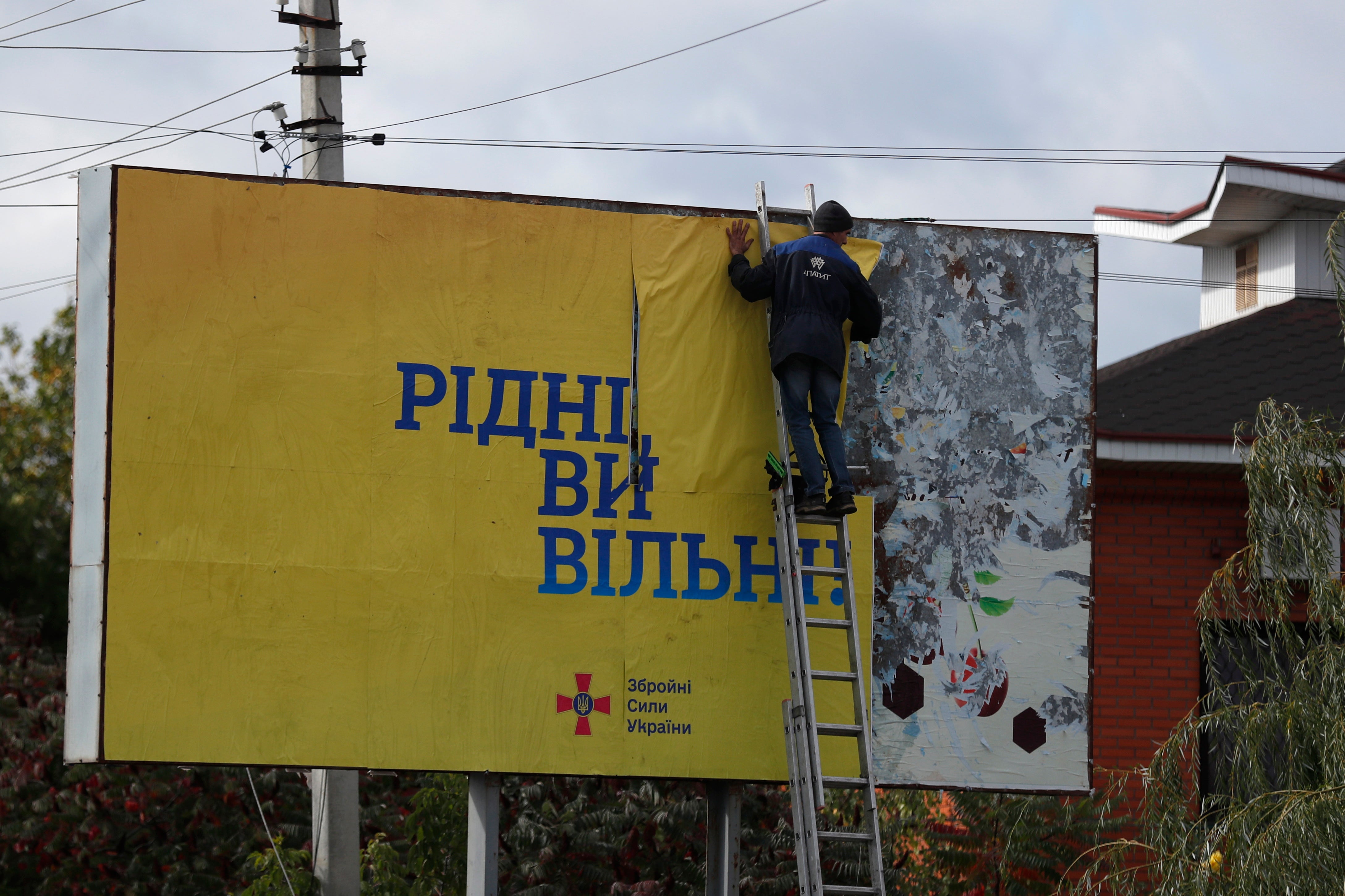 ‘Citizens you are free’: A billboard in the newly liberated city of Kupyansk, east of Kharkiv, on Monday