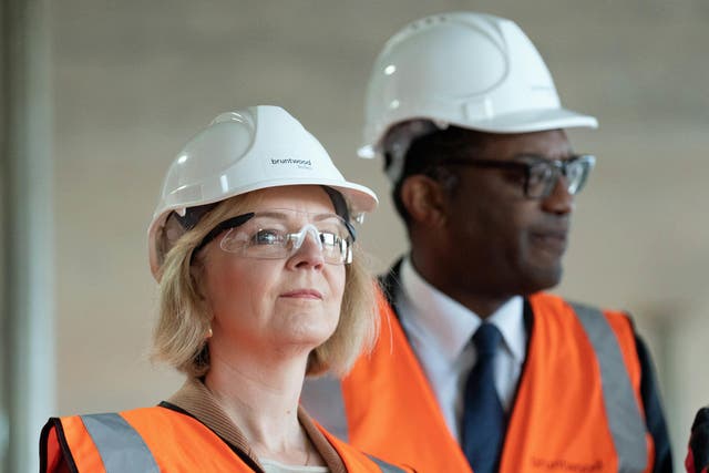 Prime Minister Liz Truss and Chancellor Kwasi Kwarteng during a visit to a construction site for a medical innovation in Birmingham (Stefan Rousseau/PA)
