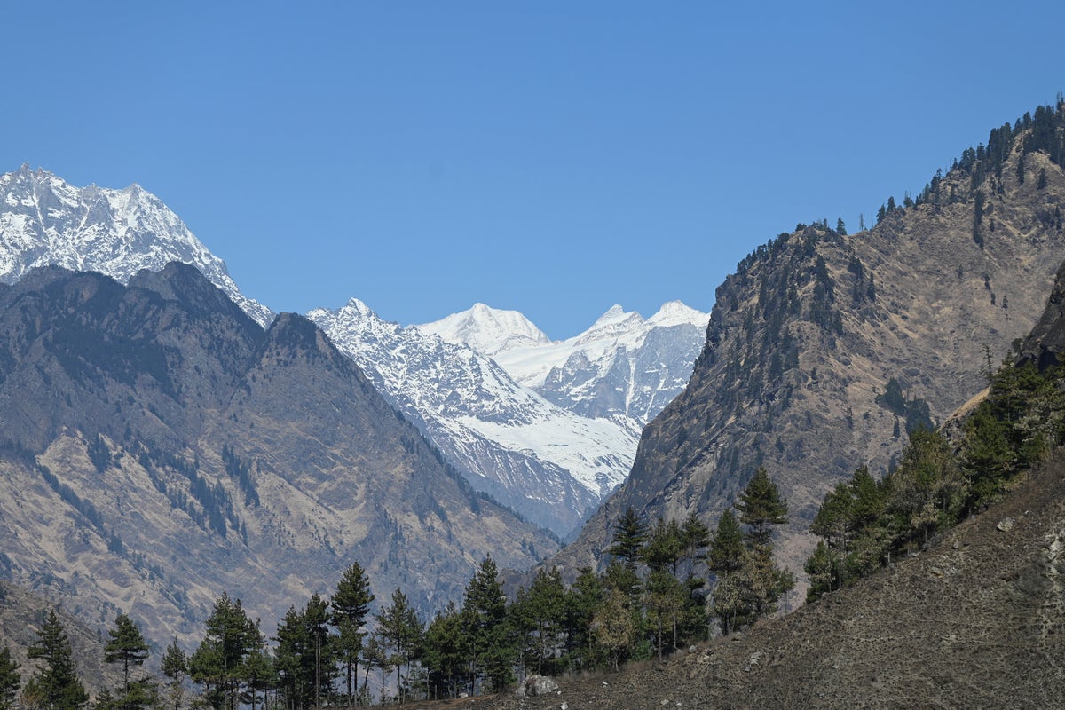 Dozens of construction workers trapped after glacier burst in Himalayas