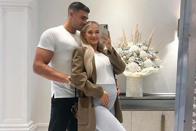 <p>Molly-Mae Hague and Tommy Fury show off her growing baby bump</p>