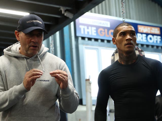 <p>Conor Benn (right) with coach Tony Sims in December 2021</p>