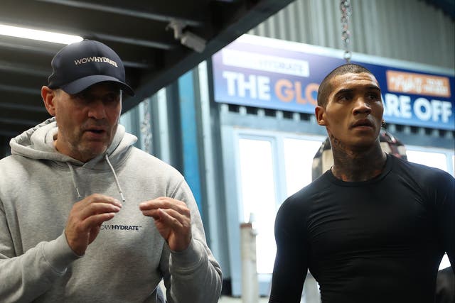 <p>Conor Benn (right) with coach Tony Sims in December 2021</p>