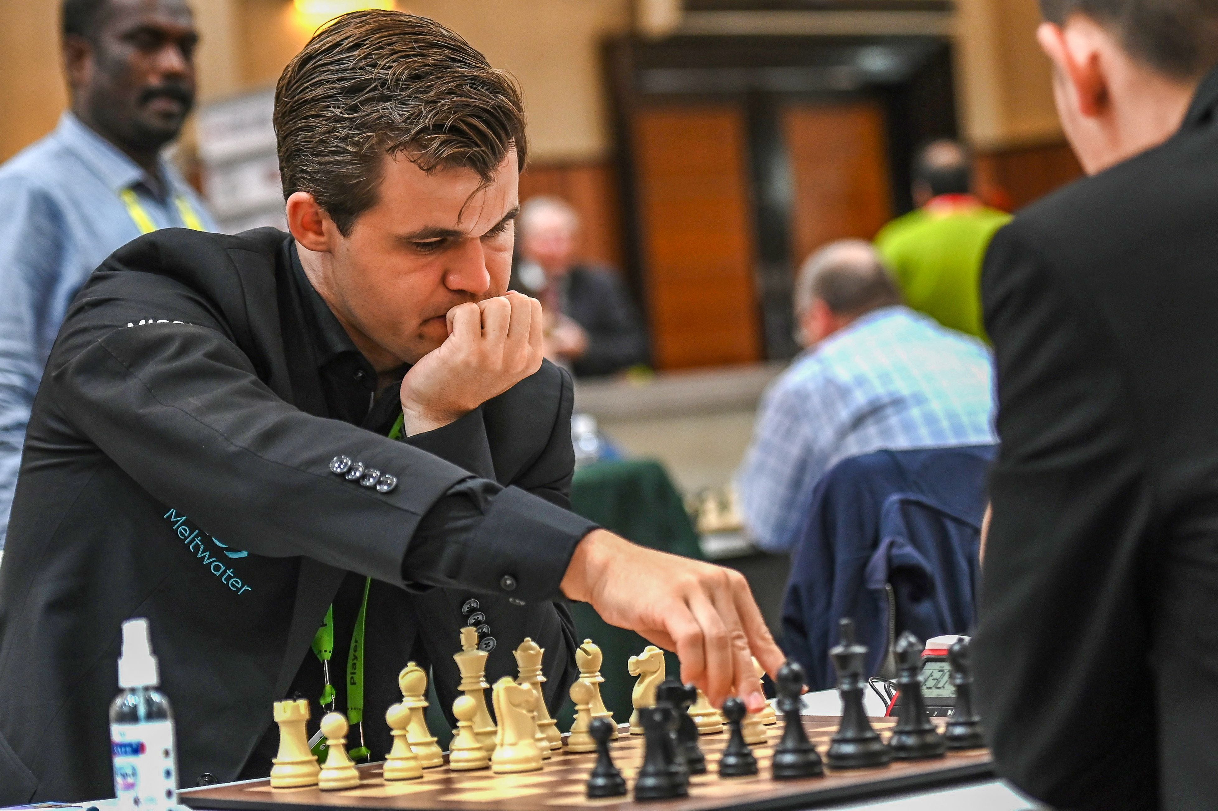 Norways Magnus Carlsen competes during his Round 4 game against the Mongolian team at the 44th Chess Olympiad 2022