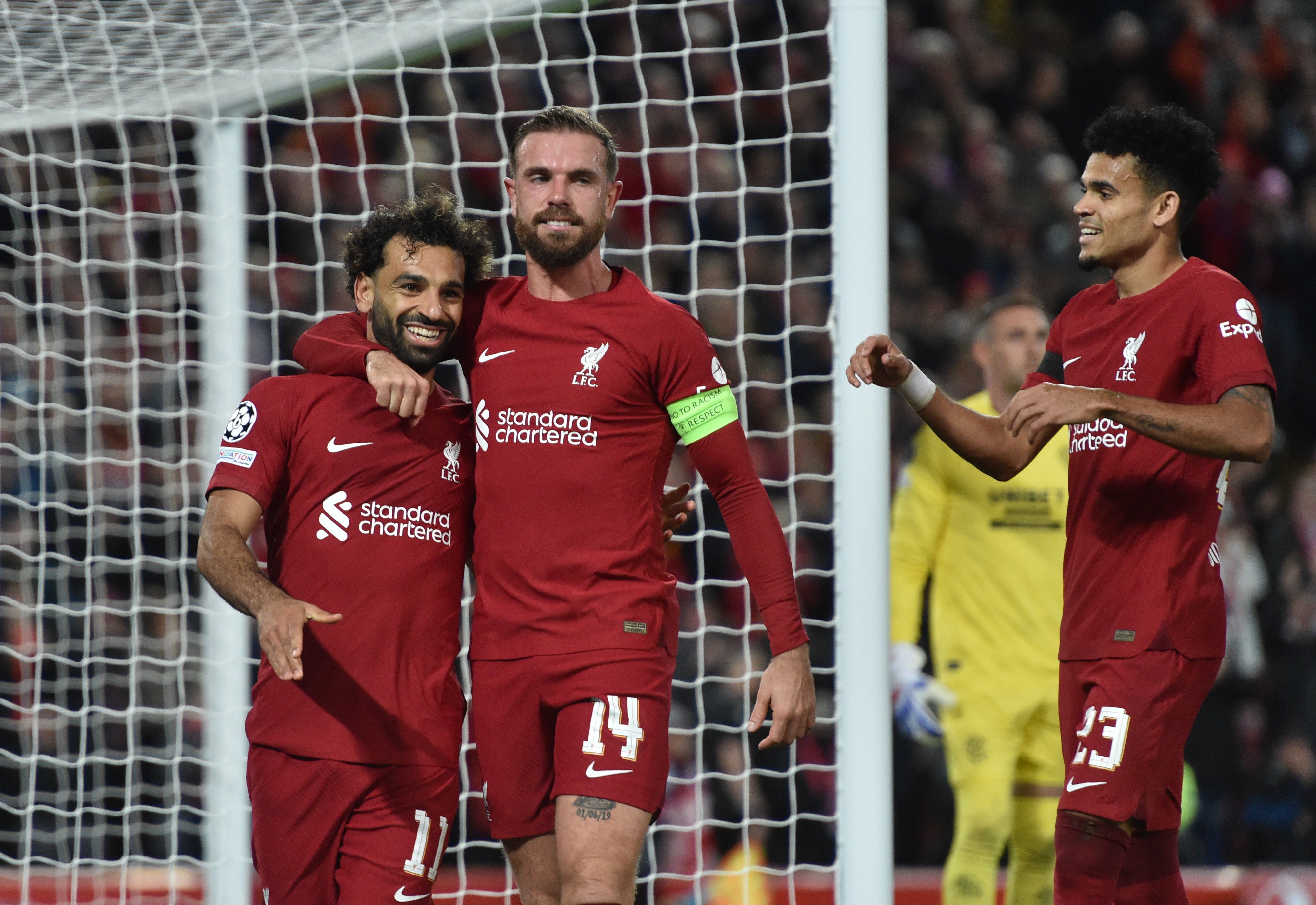 Mohamed Salah celebrates after scoring the second goal against Rangers at Anfield