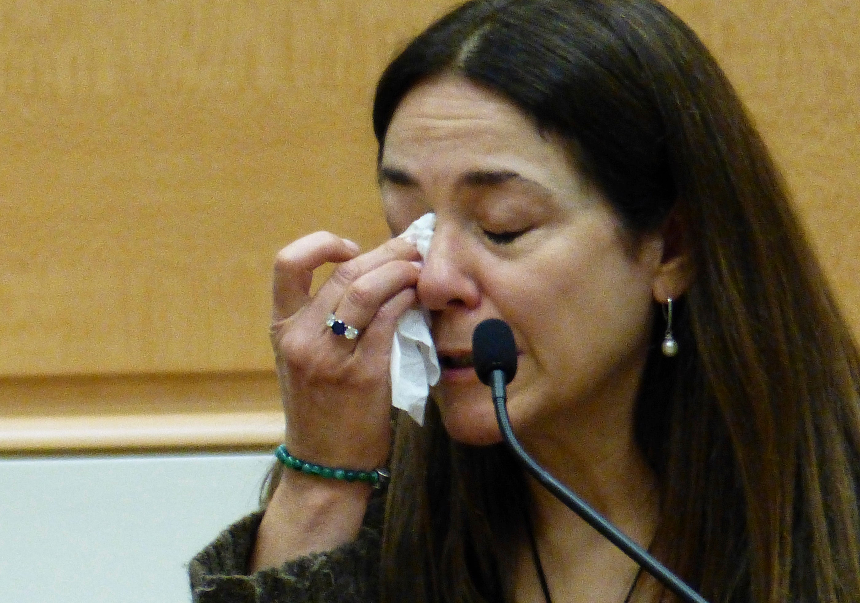 Sandy Hook mother Francine Wheeler pauses to wipe away tears as she testifies against Alex Jones on 4 October