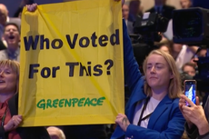 ‘Let’s get them removed’: Liz Truss speech heckled by climate protesters