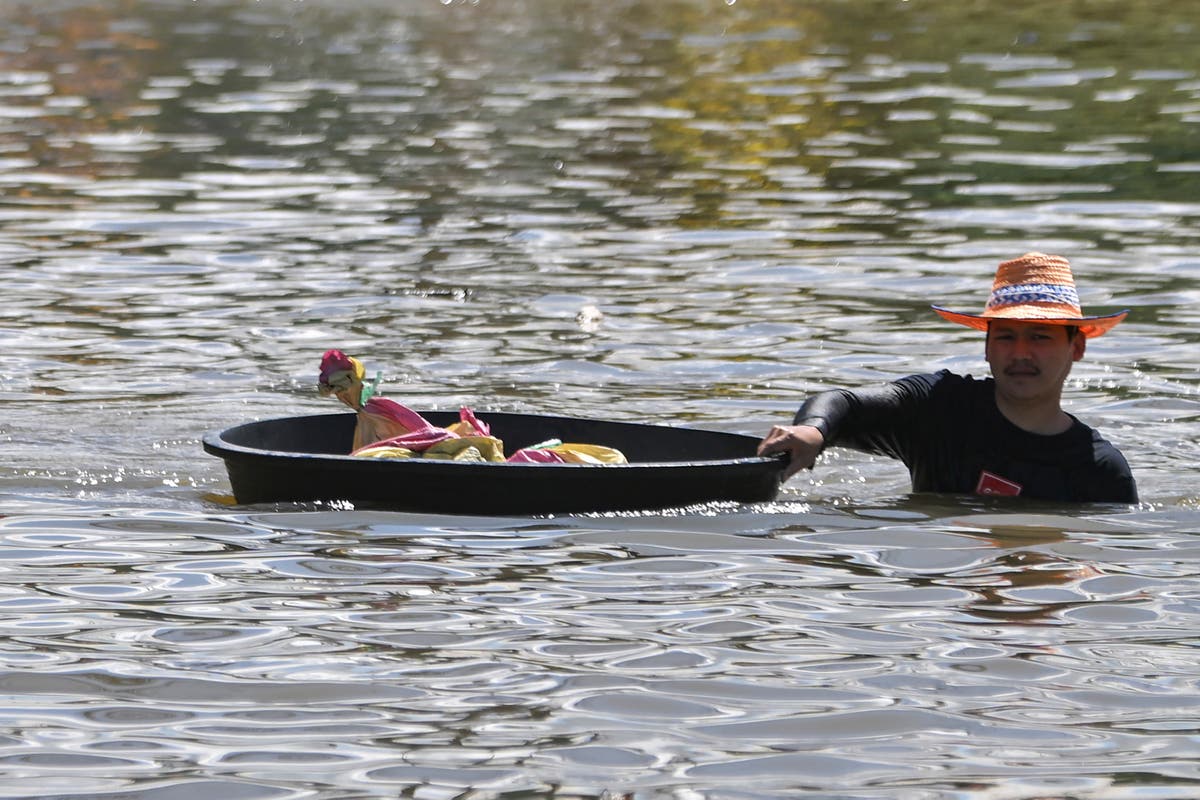 More rain feeds floods in northeastern and central Thailand