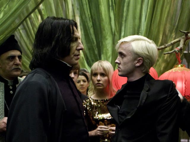 Alan Rickman (izquierda) y Tom Felton en Harry Potter