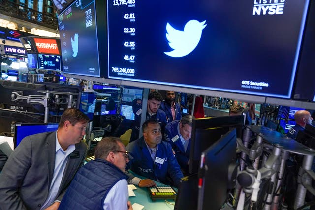 <p>Traders at the New York Stock Exchange after Elon Musk agreed to go through with the Twitter deal in October </p>