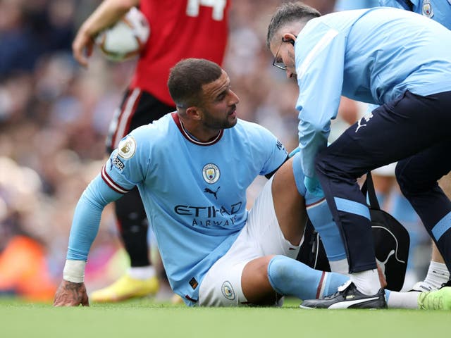 <p>Manchester City’s Kyle Walker receives medical attention</p>