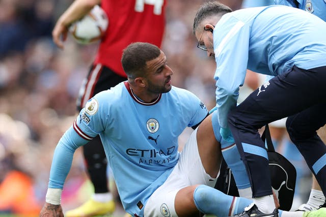 <p>Manchester City’s Kyle Walker receives medical attention</p>