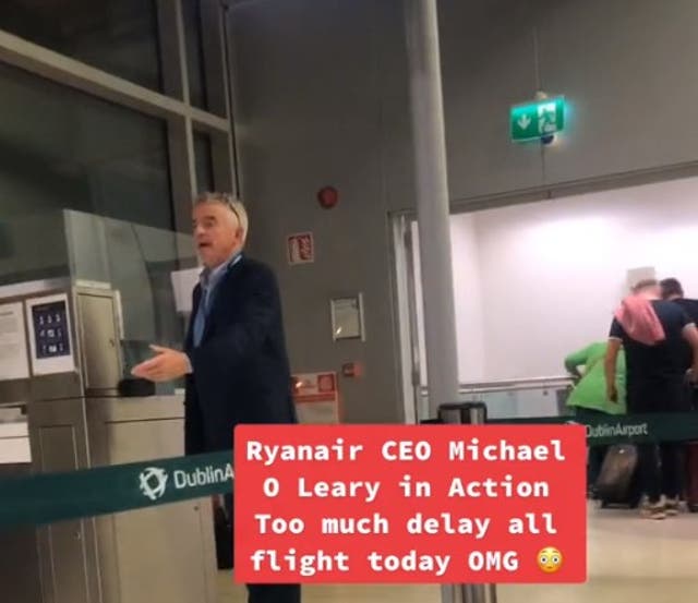 <p>Michael O’Leary was videoed helping to board guests on a Ryanair flight to Malaga</p>