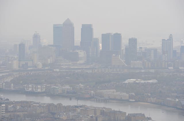 <p>File photo from 2015 shows smog over London </p>