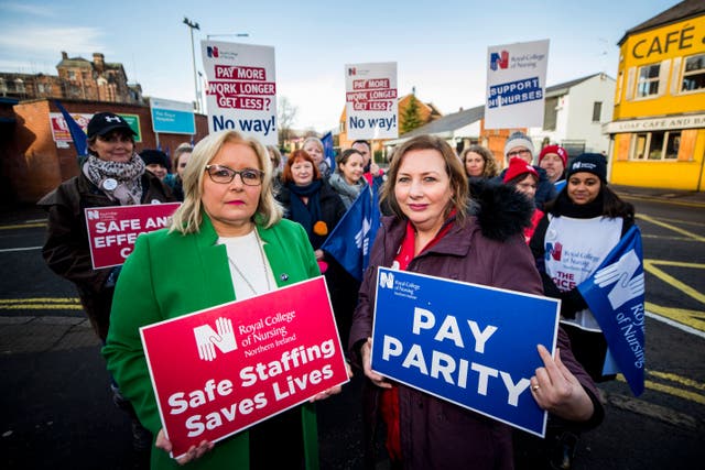 <p>Royal College of Nursing general secretary Pat Cullen (left) with Royal Belfast Hospital for Sick Children ward sister Ann McDonald on the picket line   </p>
