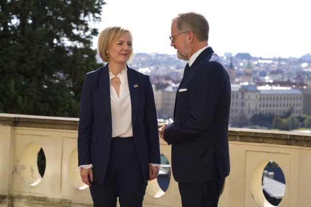 Prime Minister Liz Truss is welcomed by Prime Minister of the Czech Republic Petr Fiala, as she arrives at Kramar’s Villa, the official residence of the Prime Minister of the Czech Republic (Alistair Grant/PA)