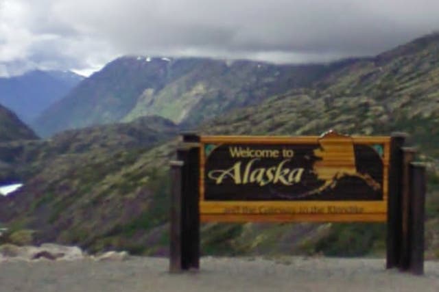 <p>A sign welcoming drivers to Alaska in Skagway, Alaska</p>