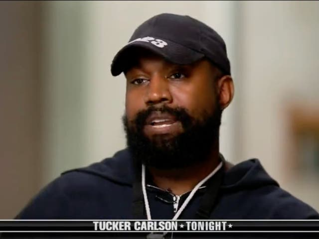 <p>Kanye West speaking to Tucker Carlson on Fox News</p>