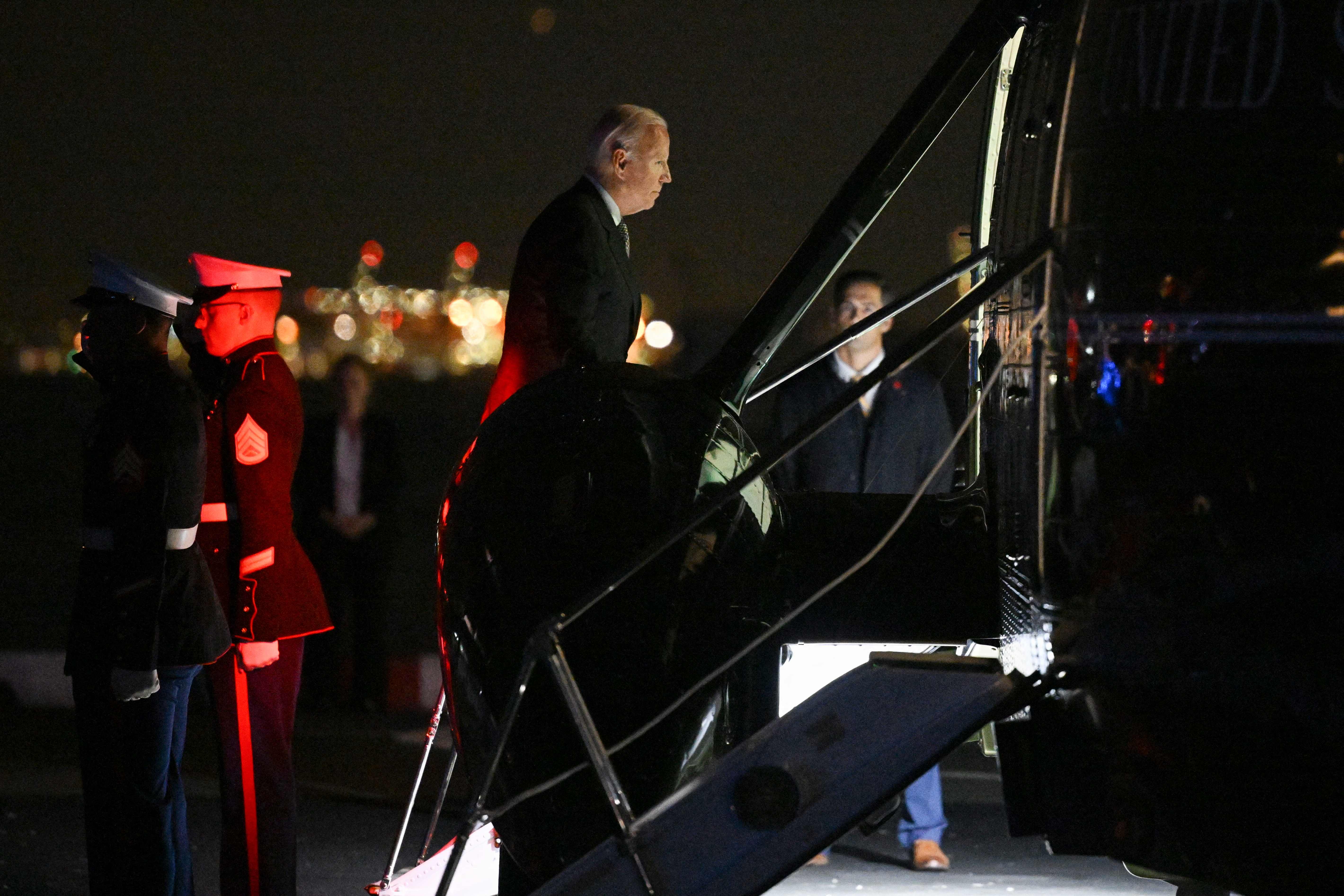 President Joe Biden boards Marine One before departing from the Wall Street landing zone in New York on October 6, 2022