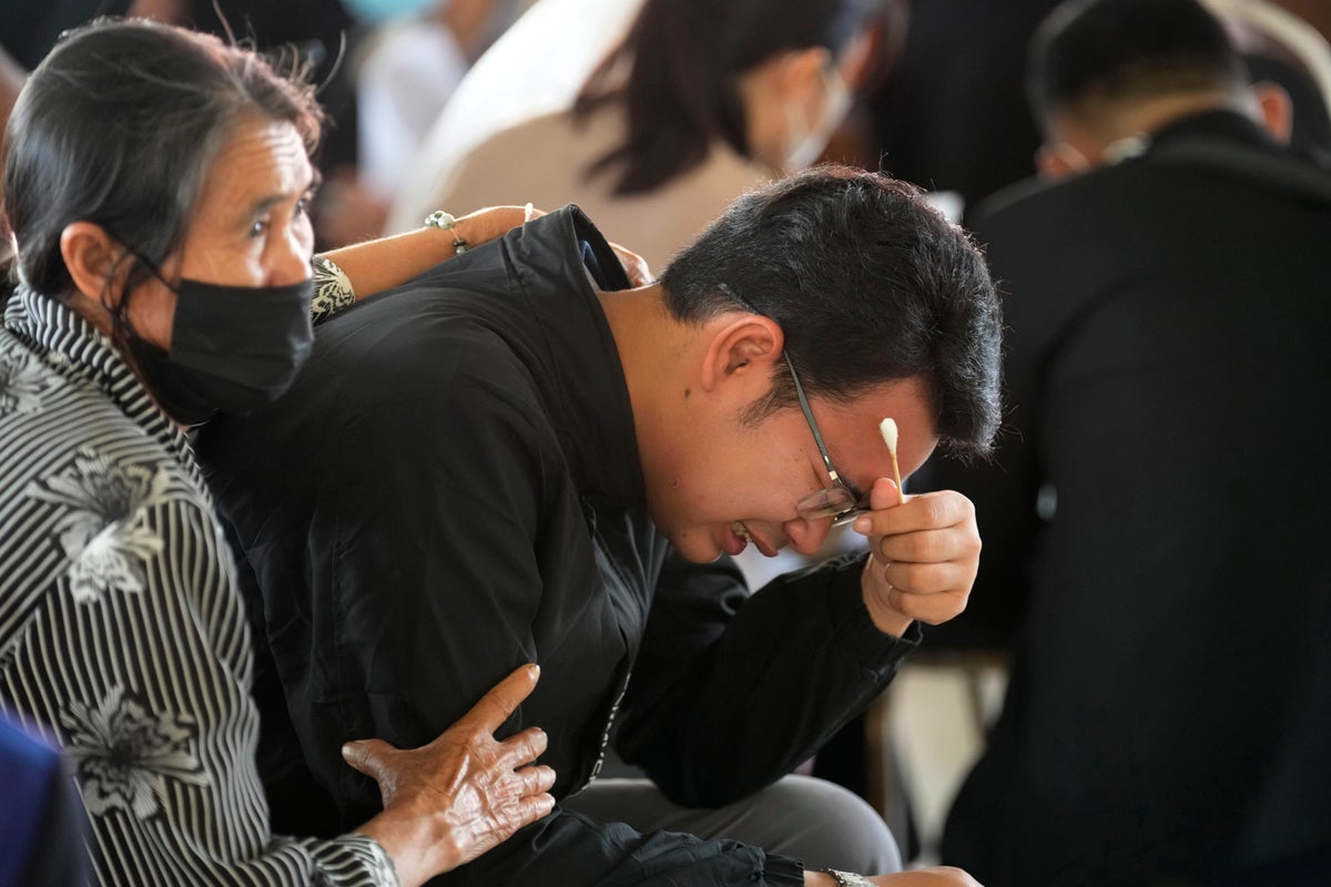 Thailand mourns children, others slain by ex-police officer