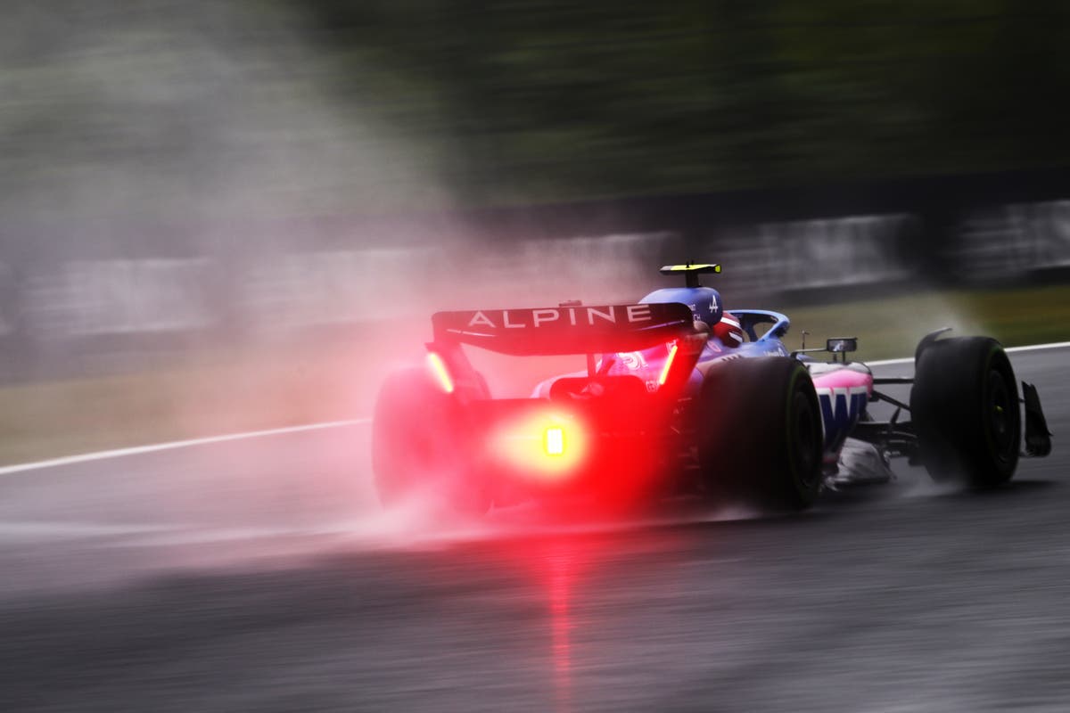 Fernando Alonso tops wet first practice at Japanese Grand Prix
