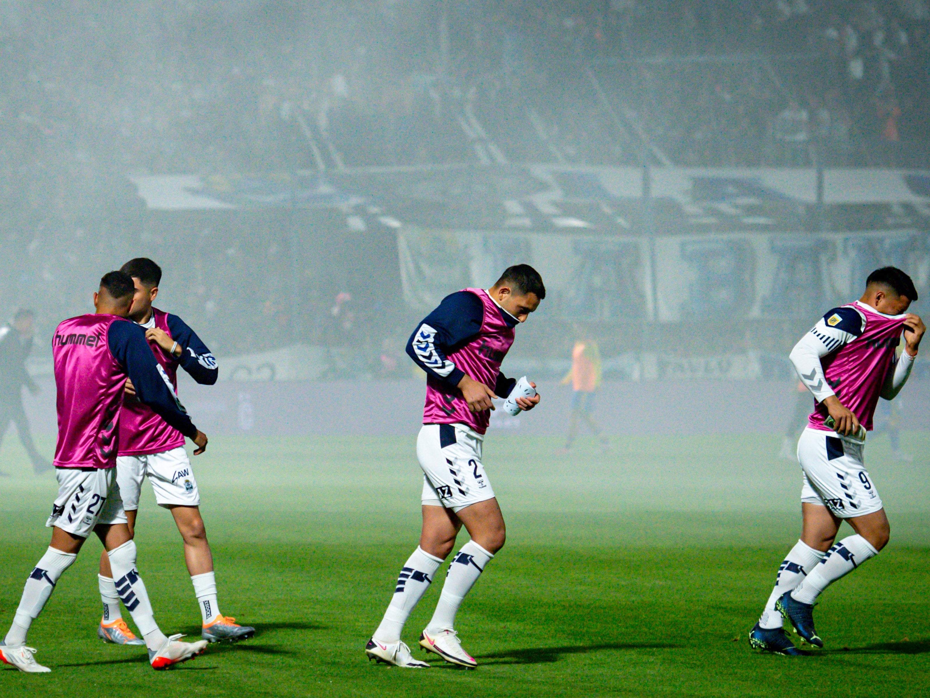 Gimnasia La Plata players were forced to cover their faces