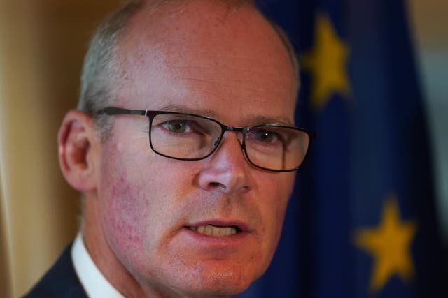 Simon Coveney said the protocol was working despite not being fully implemented (Brian Lawless/PA)